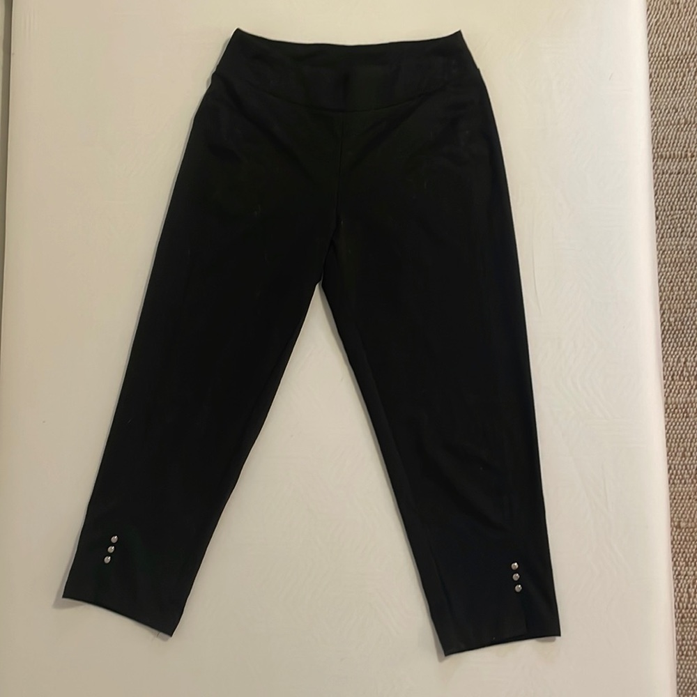Black capris with button detail